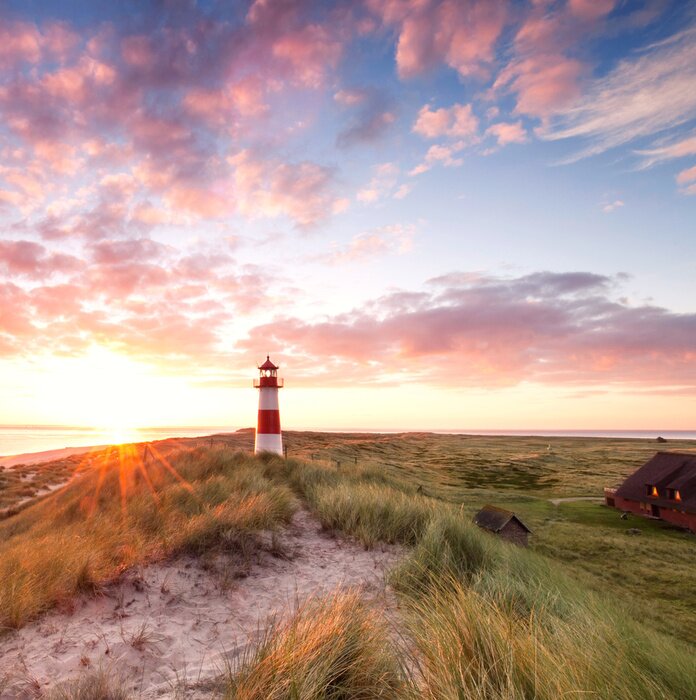 Fotobehang Vuurtoren op Sylt in de avond