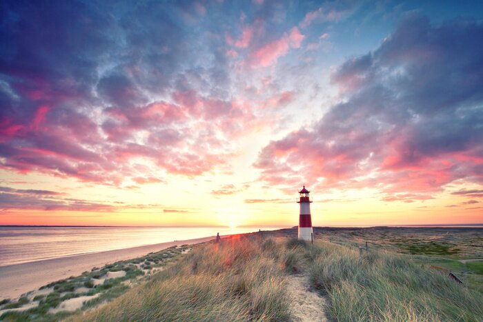 Fotobehang Vuurtoren Sylt kleurrijk landschap