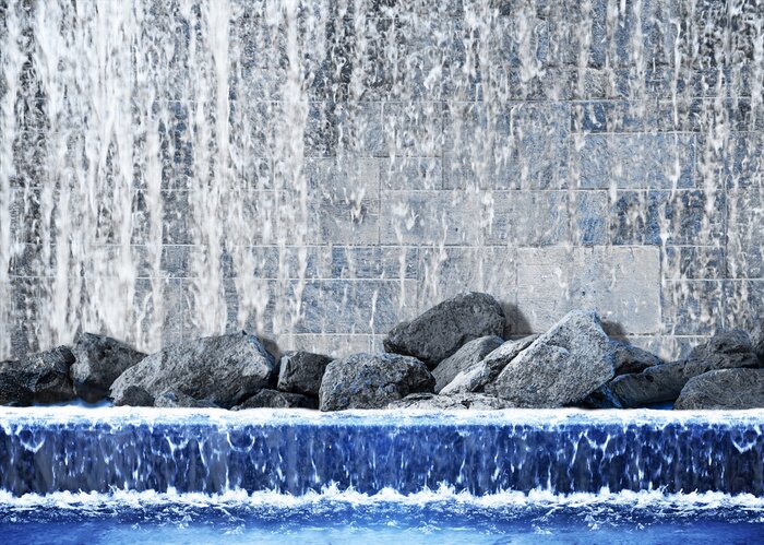 Fotobehang Waterval en stenen