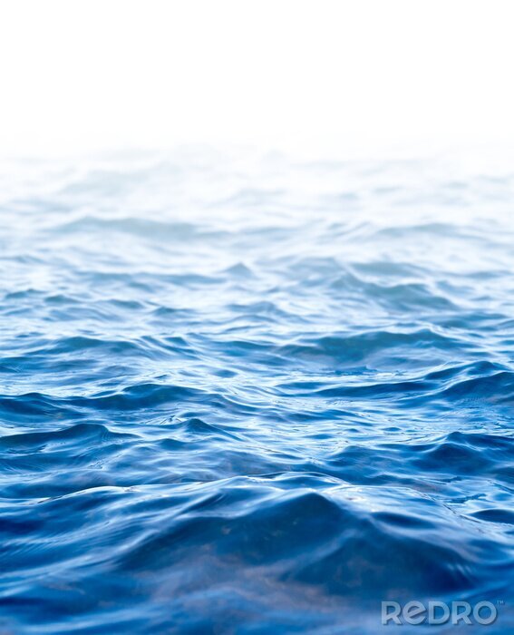 Fotobehang Winderig blauw water
