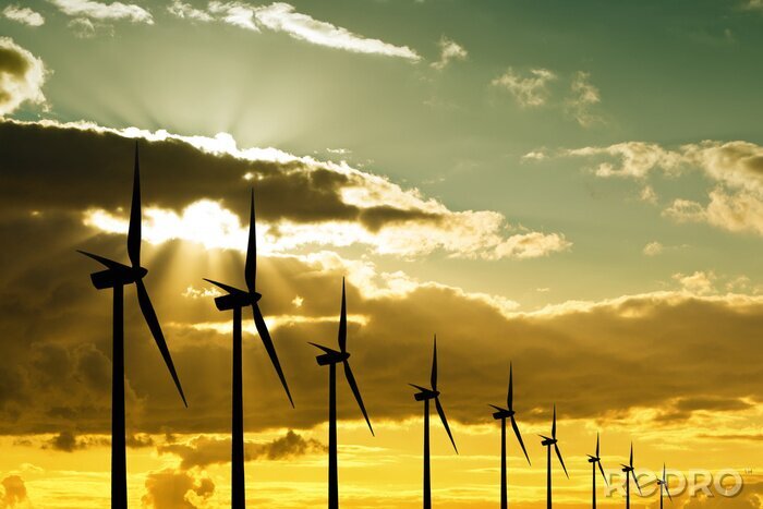 Fotobehang Windturbines bij zonsondergang