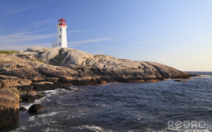 Fotobehang Witte vuurtoren boven de oceaan