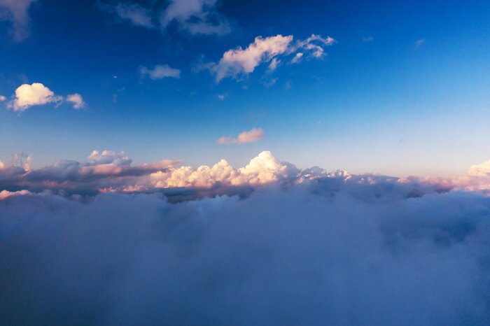 Fotobehang Wolken bij zonsopgang