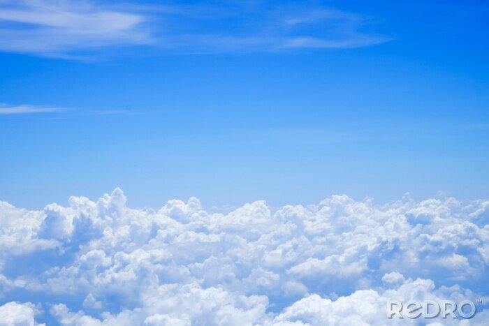 Fotobehang Wolken blauw aan de hemel