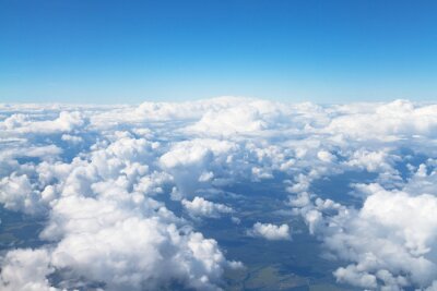 Fotobehang Wolken boven de grond