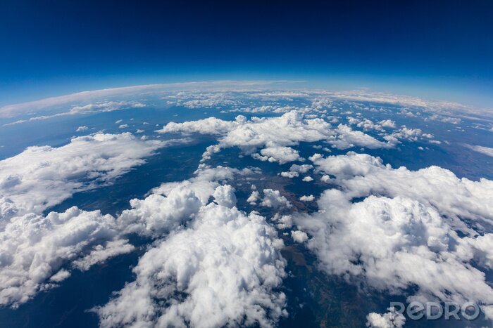 Fotobehang Wolken boven de planeet Aarde
