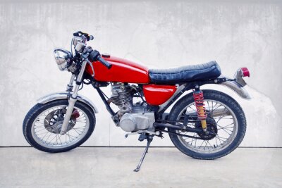 Fotobehang vintage kleur stijl van de oude klassieke motorfiets staan ​​tegen w