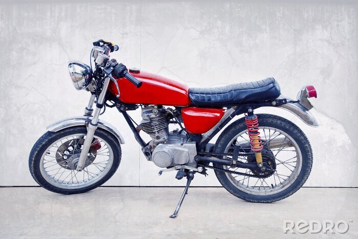Fotobehang vintage kleur stijl van de oude klassieke motorfiets staan ​​tegen w