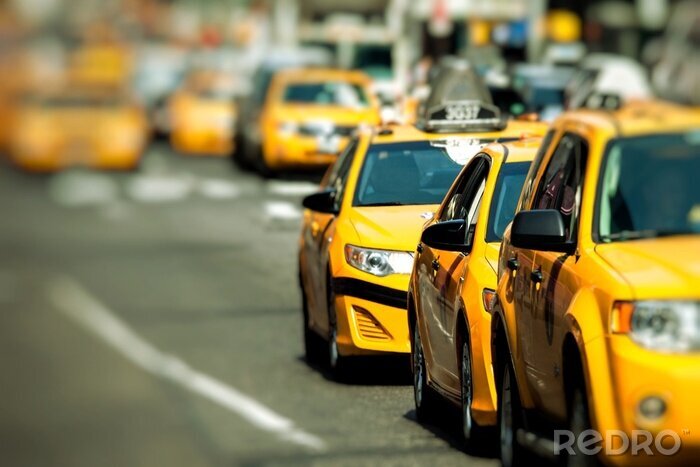 Fotobehang Yellow Cab snelheden door Times Square in New York, NY, USA.