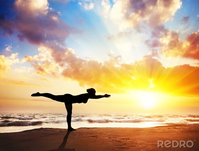Fotobehang Yoga in het licht van de zonsondergang