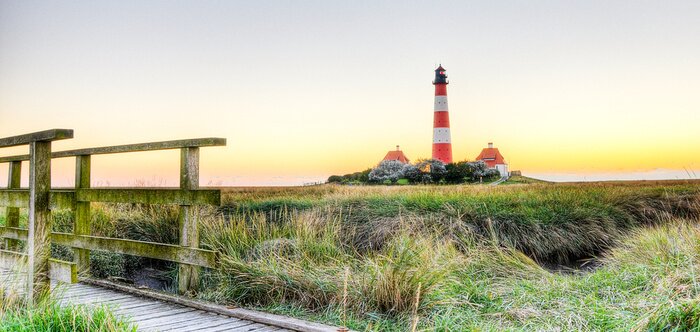 Fotobehang Zeezicht met vuurtoren