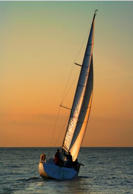 Fotobehang Zeilboot bij zonsondergang