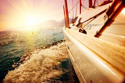 Fotobehang Zeilboot en zonneschijn