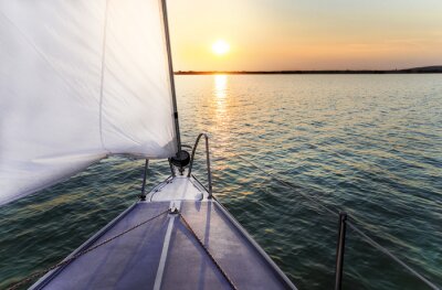 Fotobehang Zeilboot en zonsondergang