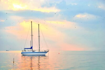 Fotobehang Zeilboot en zonsopgang