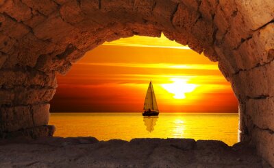 Fotobehang Zeilboot in de ondergaande zon