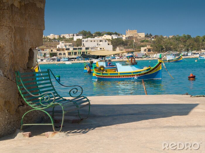 Fotobehang zitje aan de kust