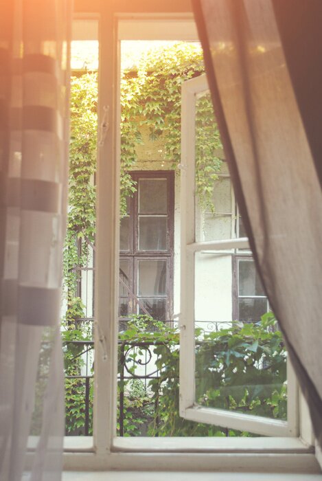 Fotobehang Zonlicht dat door het raam.