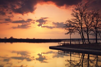 Fotobehang Zonsondergang op een kalm meer