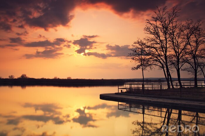 Fotobehang Zonsondergang op een kalm meer