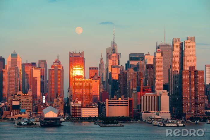 Fotobehang Zonsondergang reflecteert op de gebouwen van NY