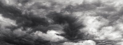 Fotobehang Zwart-witte regenwolken