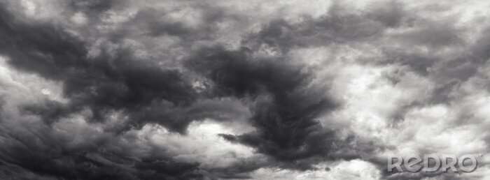 Fotobehang Zwart-witte regenwolken
