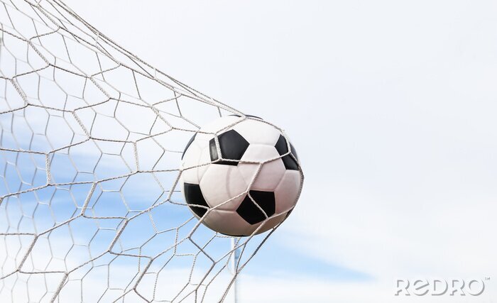 Fotobehang Zwart-witte voetbal in het net