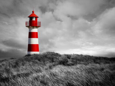 Fotobehang Zwart-witte vuurtoren op de duinen