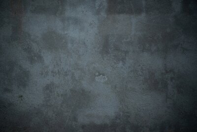 Zwartgrijze muur van beton
