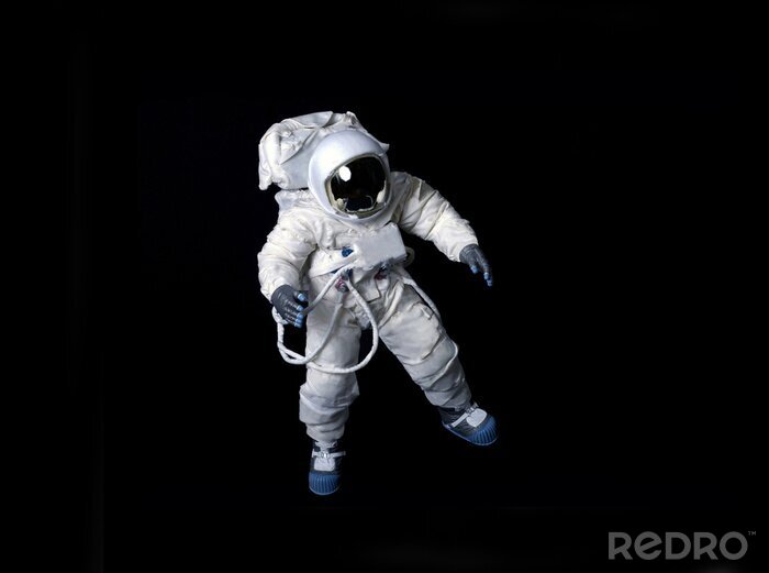 Poster Astronaut drijvende tegen een zwarte achtergrond.