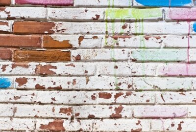 Poster Bakstenen muur en afbladderende verf