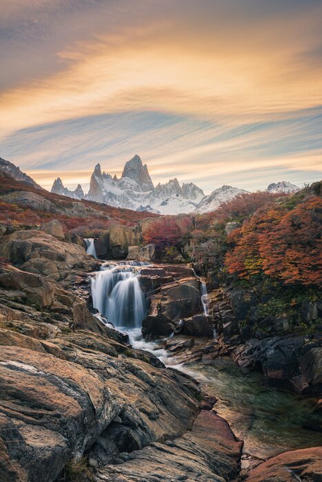 Poster Beautiful mountains and waterfalls, stunning sceneries, popular tourist attractions. The location is in the Glacier National Park, Argentina.