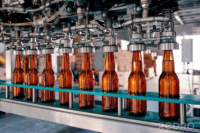 Poster Beer bottles filling on the conveyor belt in the brewery factory