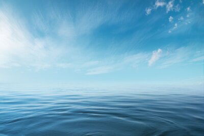 Poster Blue sea or ocean with sunny and cloudy sky