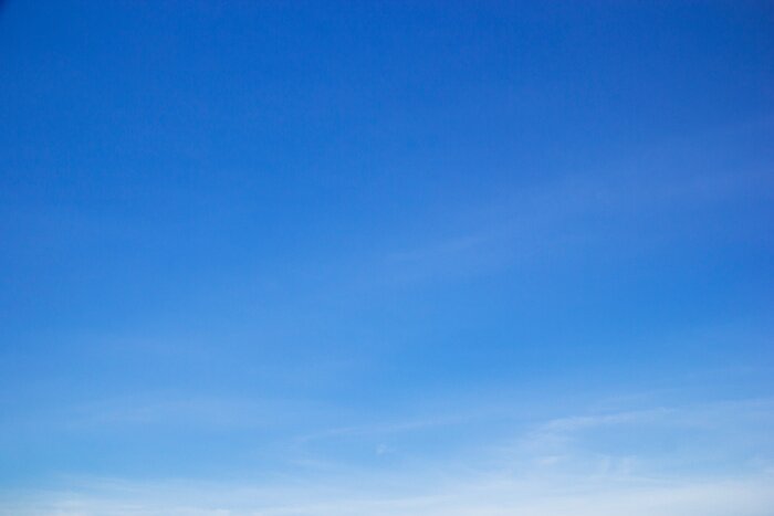 Poster Blue sky background and white clouds soft focus, and copy space
