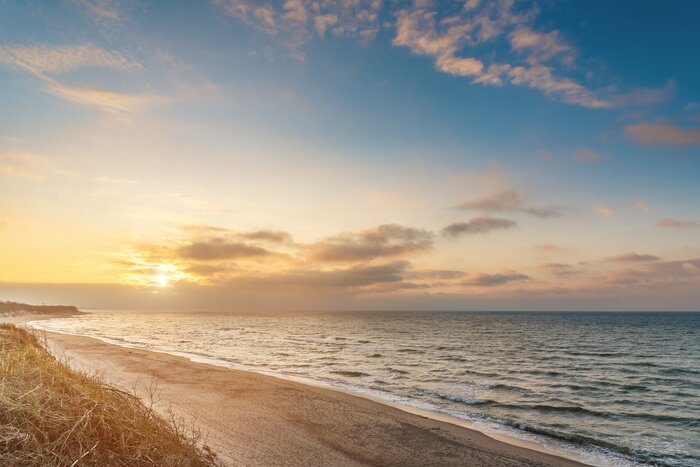 Poster Charmante zonsondergang op het strand