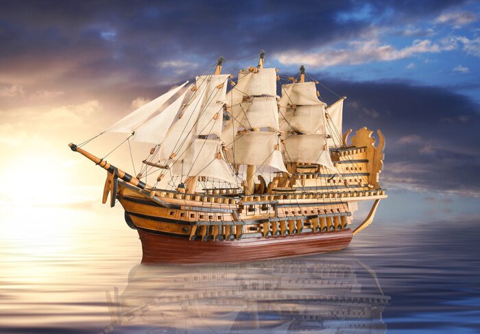 Poster Een zeilboot tegen de achtergrond van een gouden zonsondergang.