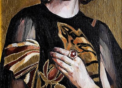 Golden elegance. Gentle female hand on the dark background of black clothes with gold ornament. The work fragment made in oil technique.