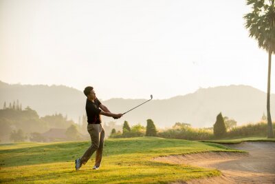 Poster golfer  playing  golf  at  golf  course