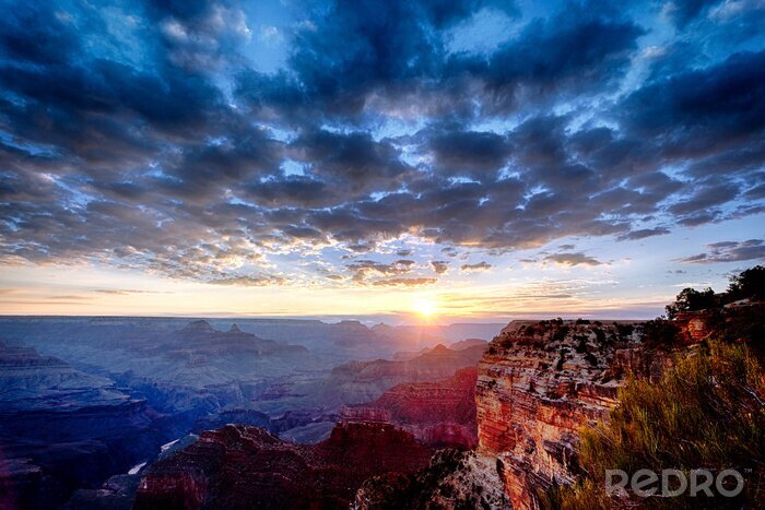Poster Grand Canyon en donkere wolken