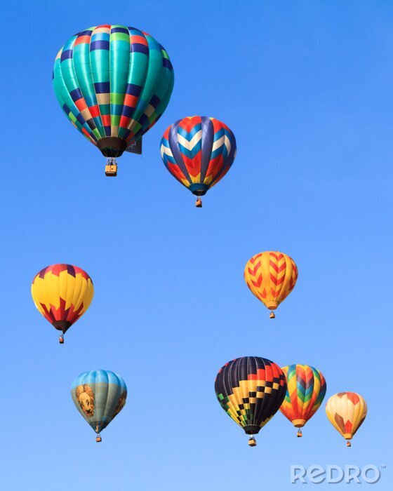 Poster heteluchtballonnen over blauwe hemel