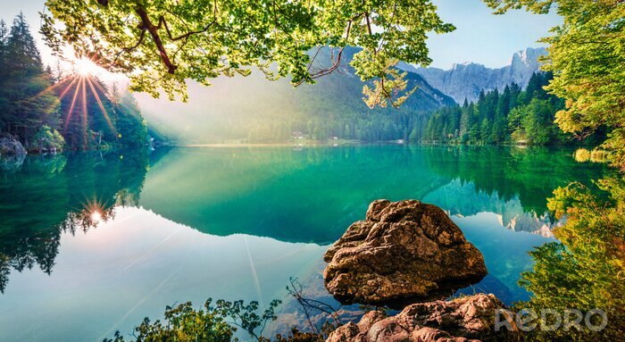 Poster Impressive morning view of Fusine lake. Attractive summer scene of Julian Alps with Mangart peak on background, Province of Udine, Italy, Europe. Traveling concept background.