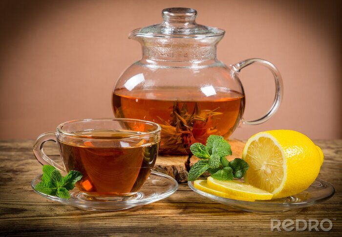 Poster Kop en theepot thee met muntblad en citroen