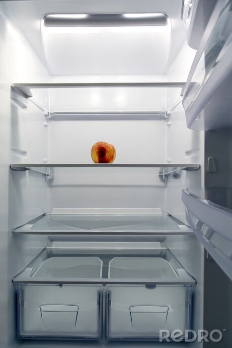 Poster Lege koelkast met een perzik