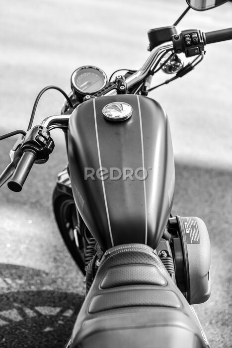 Poster motorcycle parked on the street