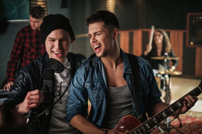 Poster Music band having rehearsal in a studio