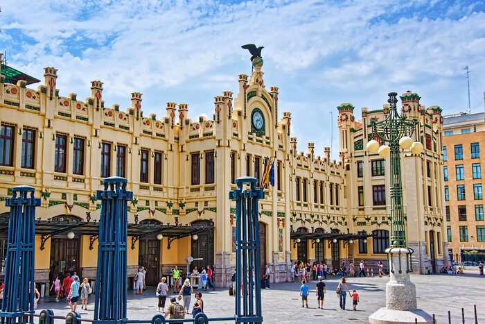 Poster North Railway Station in Valencia, Spain. People on the background