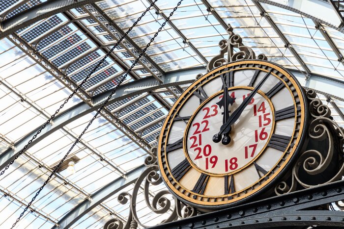 Poster Old-fashioned style clock at Kings Cross train station in London