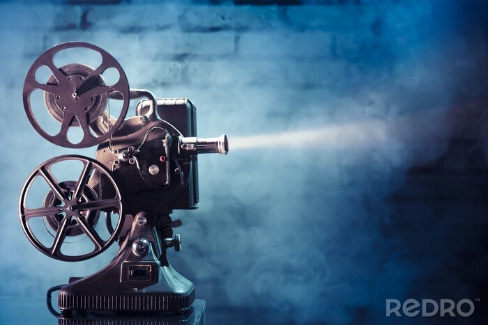 Poster oude filmprojector met dramatische verlichting